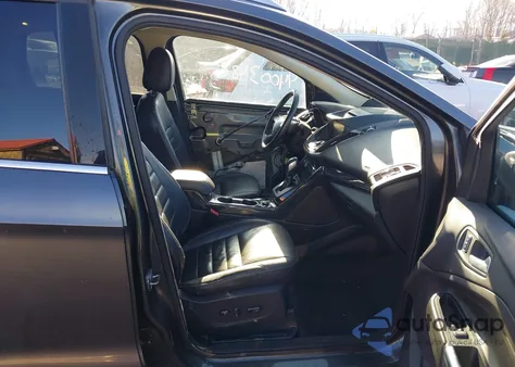 2015 Ford Escape Titanium z USA, uszkodzony, nr VIN 1FMCU9J91FUC02880